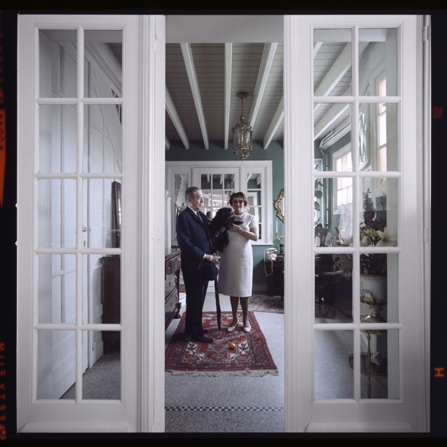 Rene & Georgette Magritte with their dog by Lothar Wolleh